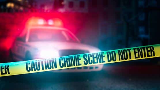 Shockoe police officer crime tape at crime scene